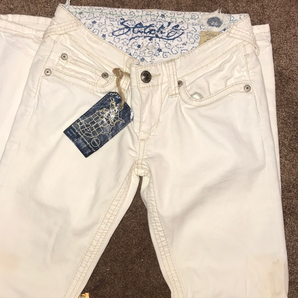 White stitch tailored denim. Size 26